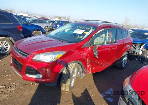 2016 Ford Escape Titanium z USA, uszkodzony, nr VIN 1FMCU0JXXGUC54620
